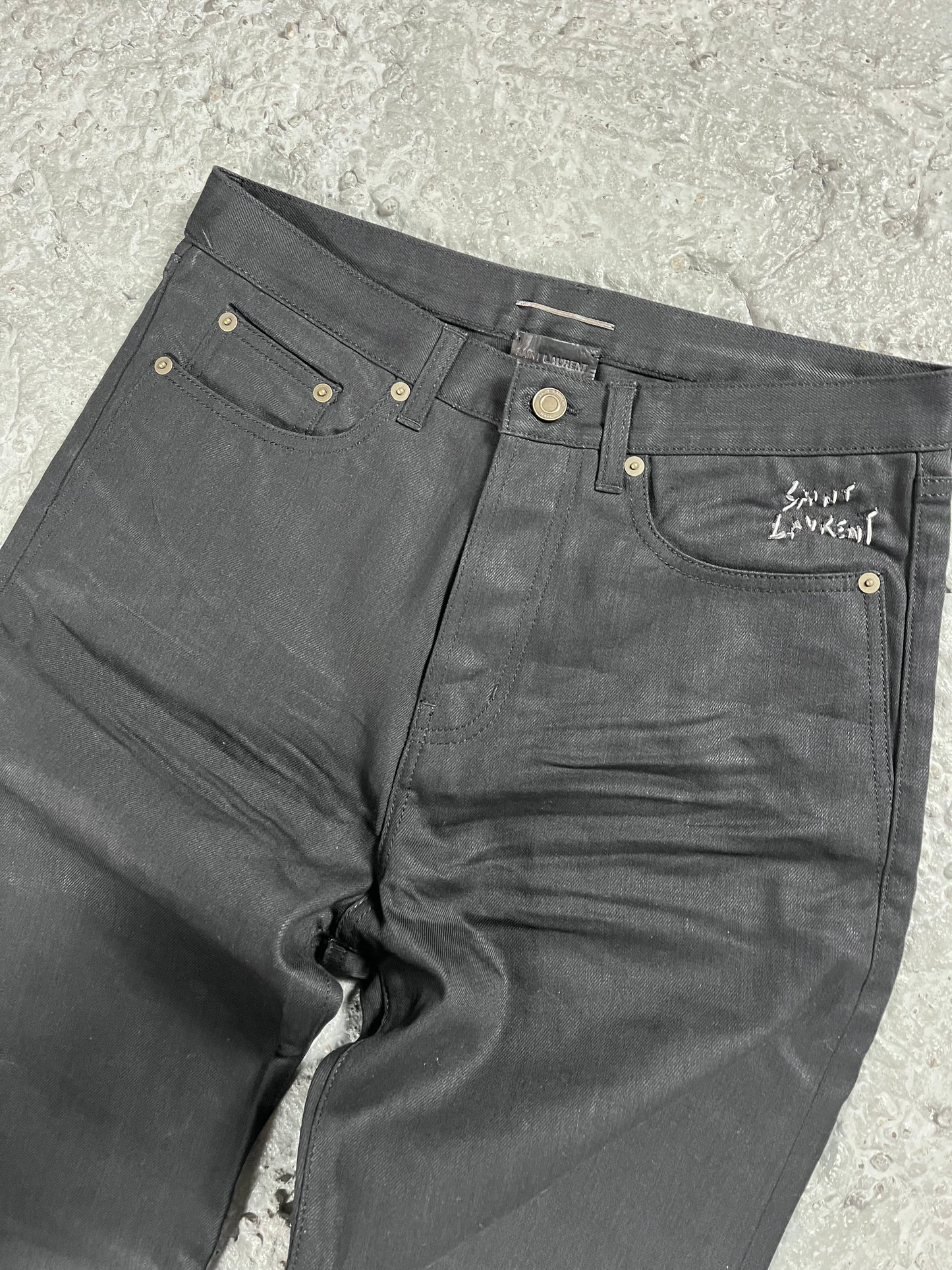Saint Laurent stacked coated jeans FW17 runway sample